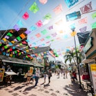 Playa Del Carmen, Mexico - December 27, 2016: Tourists exploring famous shopping street in Playa Del Carmen - 5th Avenue (Quinta Avenida), full of shops and cafes.